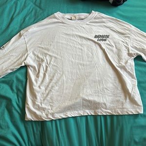 Size LG, from urban outfitters, very soft loose fabric, crop top long sleeve